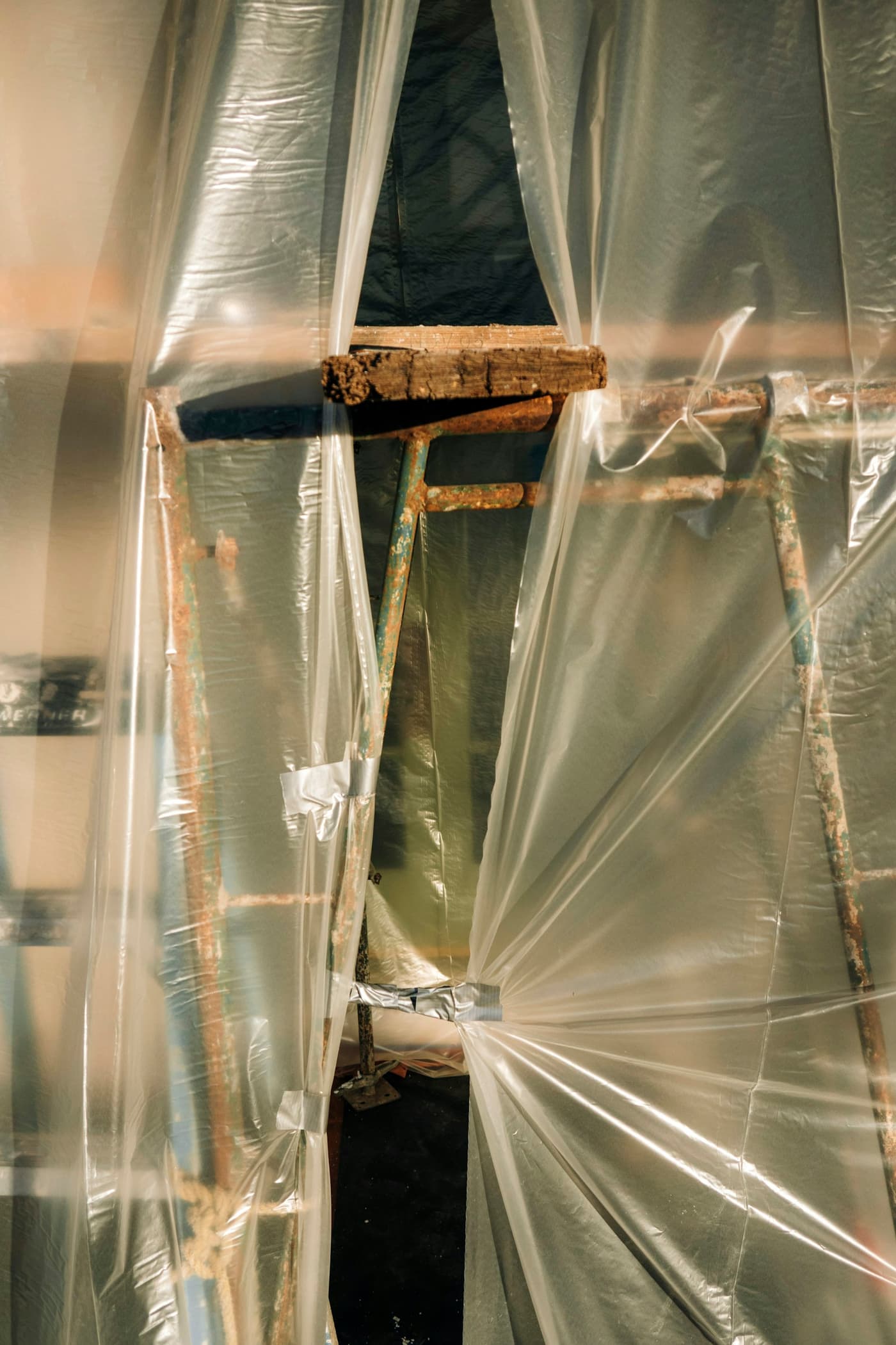 Clear plastic sheeting sealing off a work area